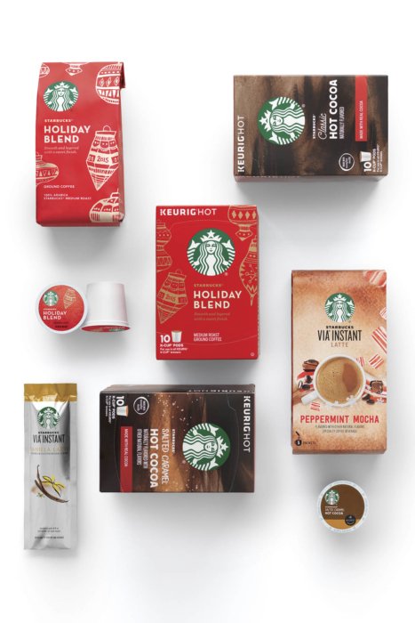 a group of starbucks boxes of coffee