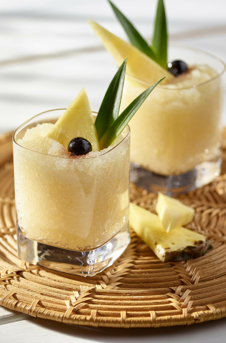 Pineapple tequila cocktail with fresh fruit garnish – commercial drink photography by OMS Photo.