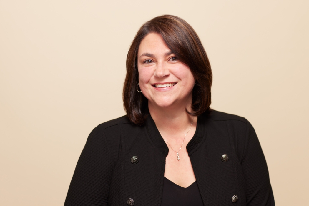 a woman smiling at camera
