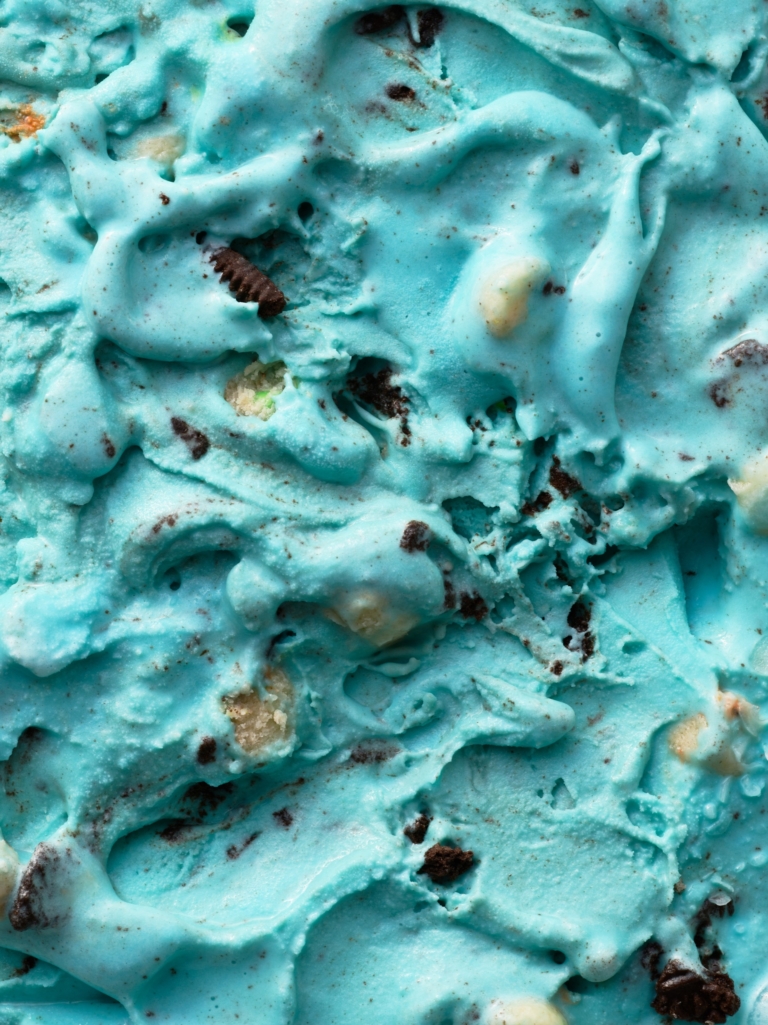a close up of a blue ice cream