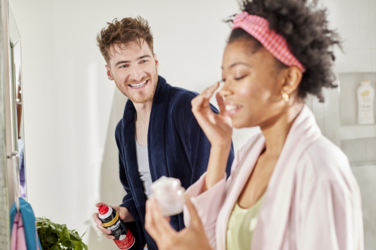 a man and woman in bathrobes