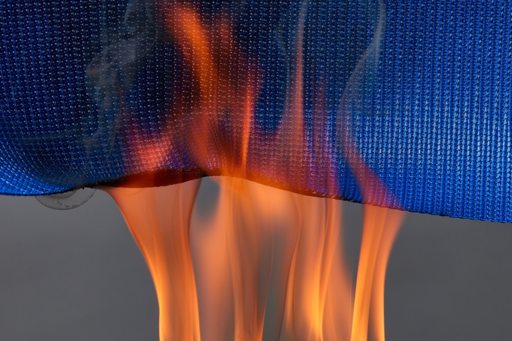 a blue and green mesh with a fire