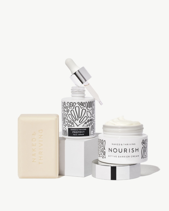 a group of white containers with white labels