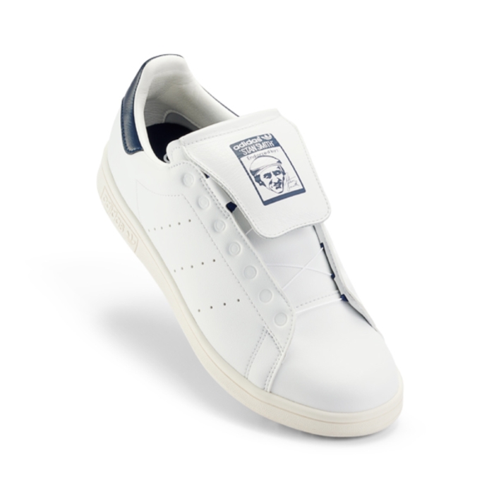 a white shoe with a logo on it