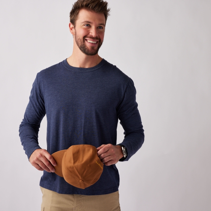 a man holding a hat, Cintas, construction, workplace, in studio, model