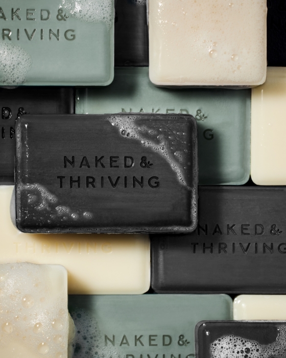 Close-up of Naked & Thriving natural soaps with rich textures, photographed by OMS Photography for commercial advertising use.