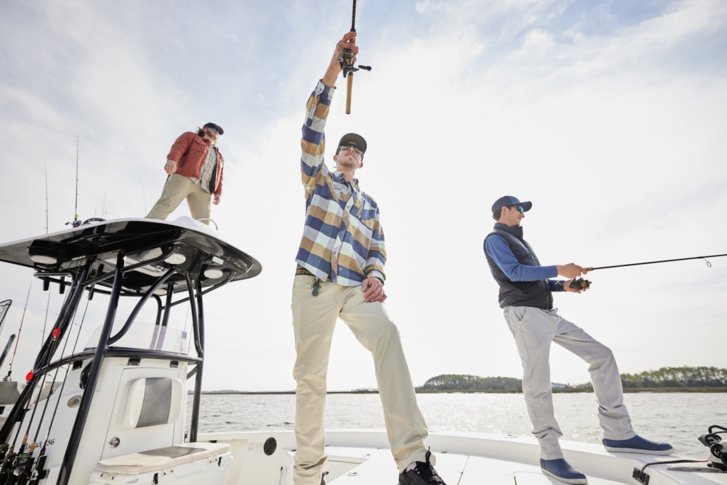 Group of three men outdoors in fishing gear, captured for adventure lifestyle and outdoor brand photography by OMS Photography