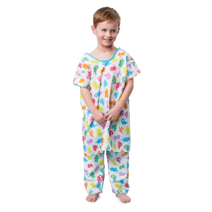 Children wearing colorful pediatric hospital gowns photographed on a white background by Marci Rhodes of OMS Photography – clean textile image showcasing fit, pattern, and comfort.