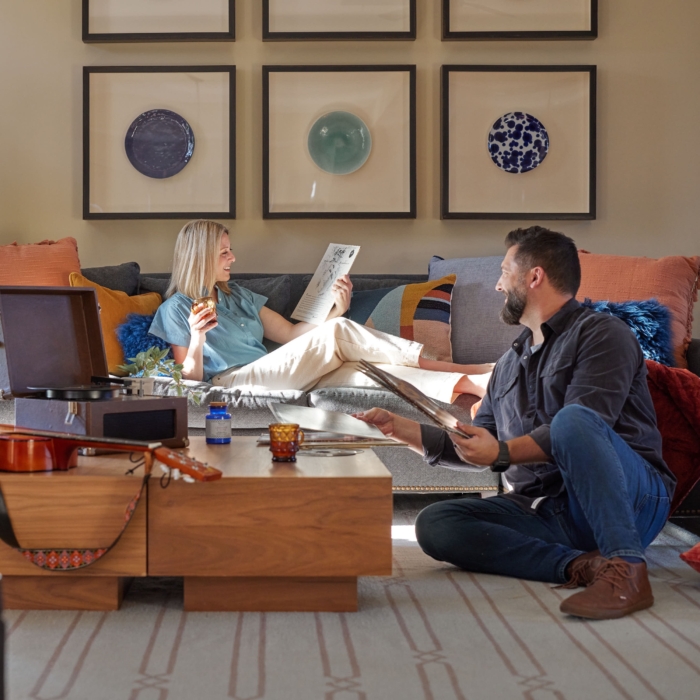 a man and woman sitting on a couch