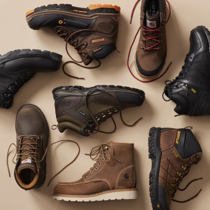 Multiple work boots arranged in a grid layout for ecommerce product photography