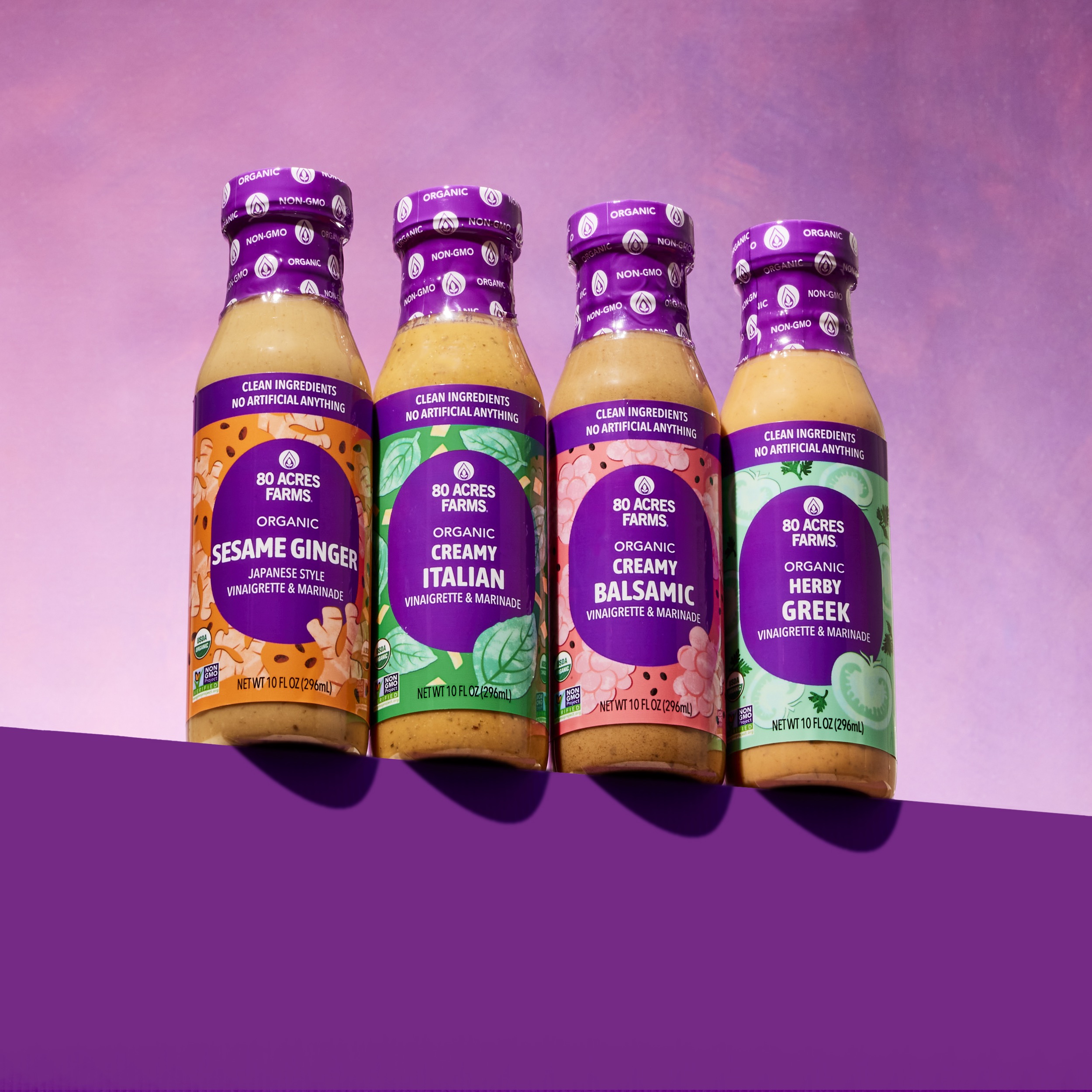 Lineup of bottled salad dressings styled for CPG packaging photography