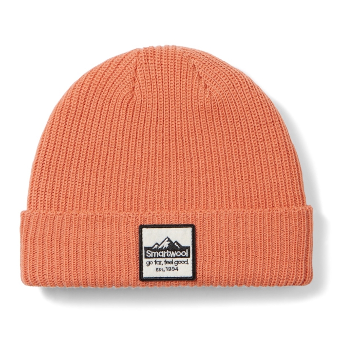 Orange knit beanie displayed on a clean white background