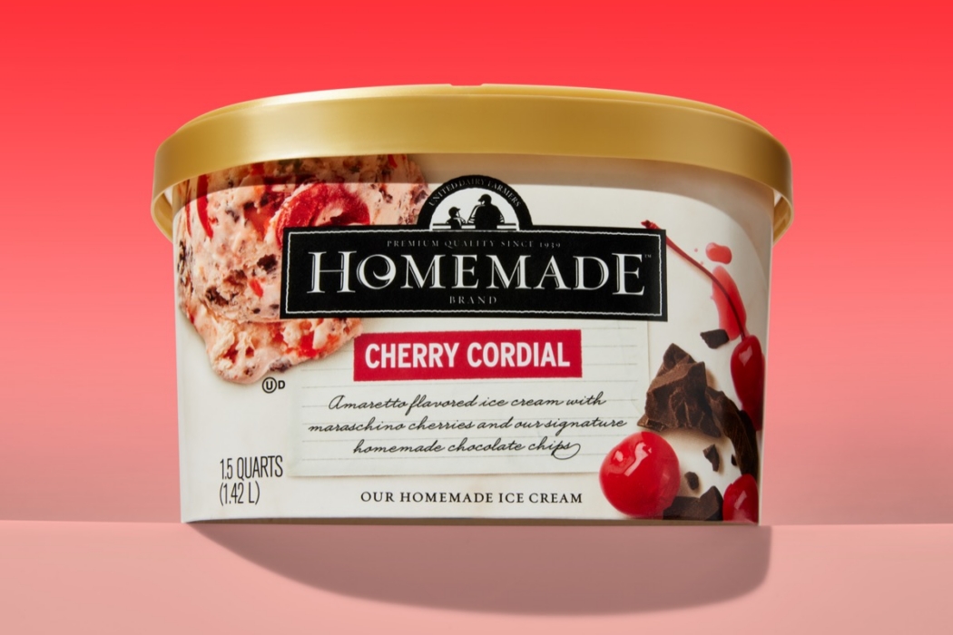 Homemade Brand Cherry Cordial ice cream pint on soft pink background