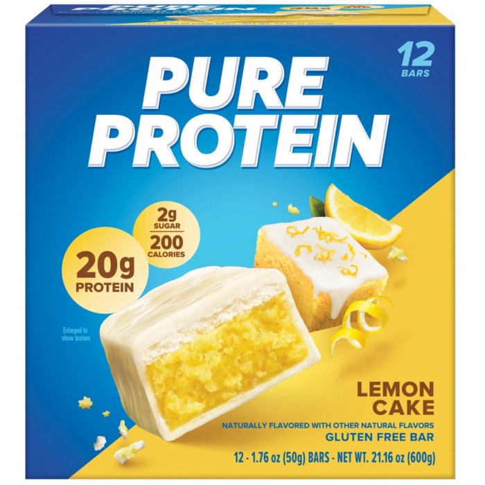 Pure Protein Lemon Cake flavor protein bar box with yellow cake bar and lemon on yellow background